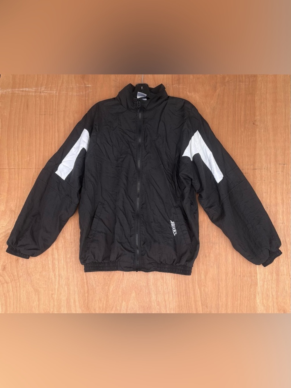 Brooks Black Windbreaker with Red Logo Accent